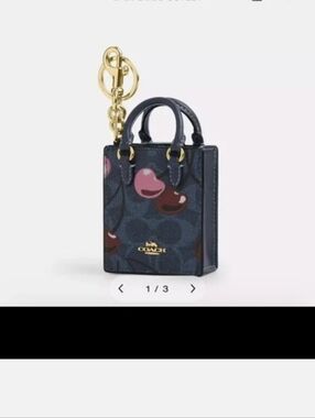 Coach North/South Bag Charm Original Canvas With Cherry Print